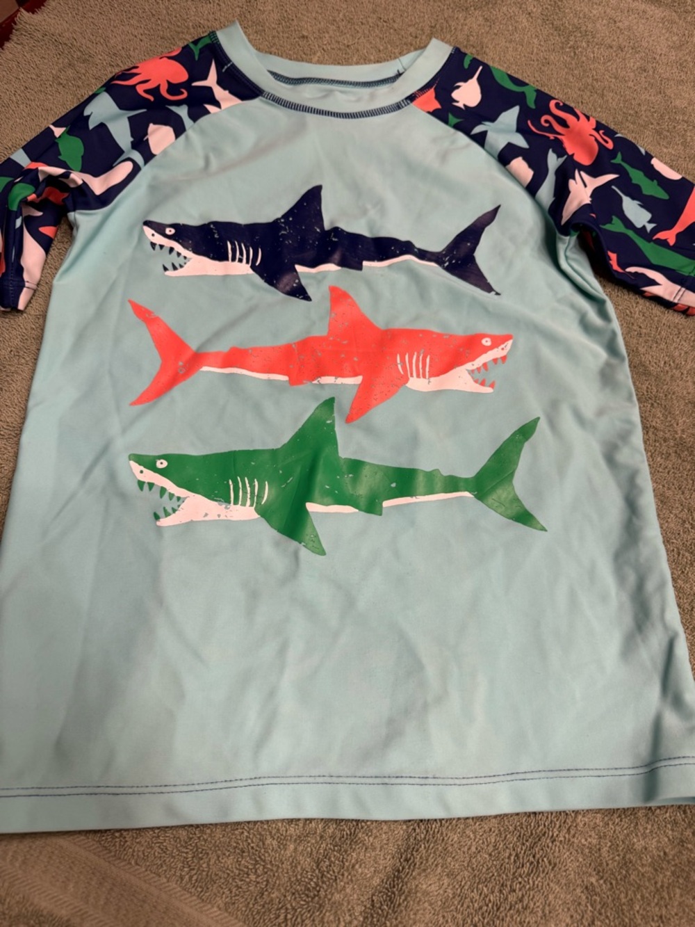 Hatley Light Blue Rashguard with Navy, Coral and Green Sharks